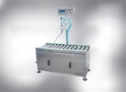 All All - Oil Weighing Filling Machine by Jinan Xunjie Packing Machinery Co., Ltd.